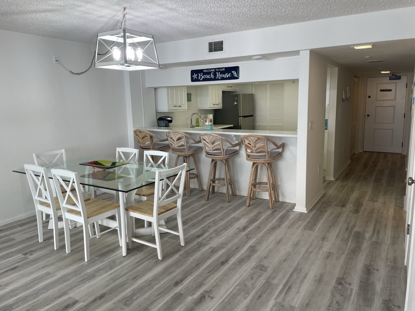 Dining area and breakfast bar inside the condo
